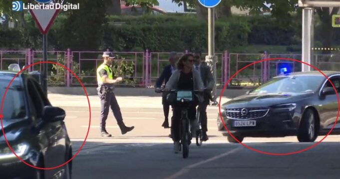 Spanish Environmenal Minister Rides a Bike to Meeting with EU Colleagues Flanked by Gas Guzzling Armored Cars | The Gateway Pundit | by Jim Hoft