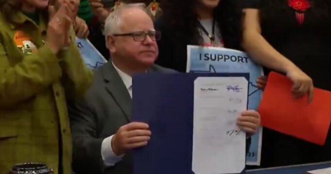 Flashback: VP Pick Tim Walz Smiles for Cameras as He Signs Bill That Gives Illegal Immigrants Drivers Licenses | The Gateway Pundit