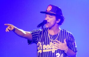 Bruno Mars keeps the rumors of his $50 million gambling debt alive with fresh joke