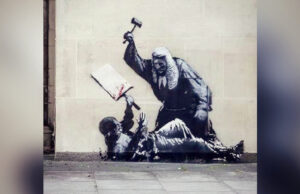 New Artwork by British Street Artist Banksy Appears on the Wall of Royal Courts of Justice, in London – Is Immediately Covered Up, as Police Weigh Charges of ‘Criminal Damage’ | The Gateway Pundit